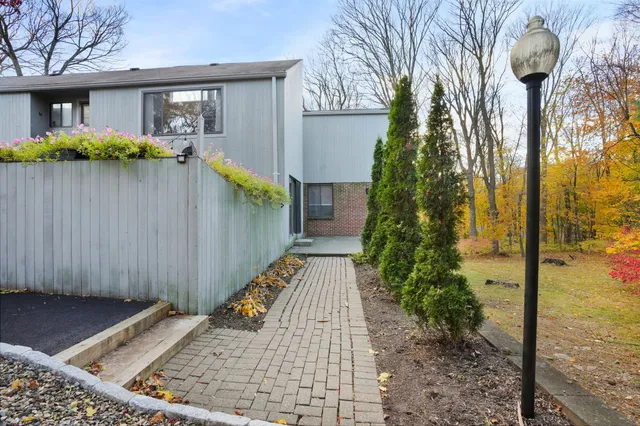 a view of a house with garden