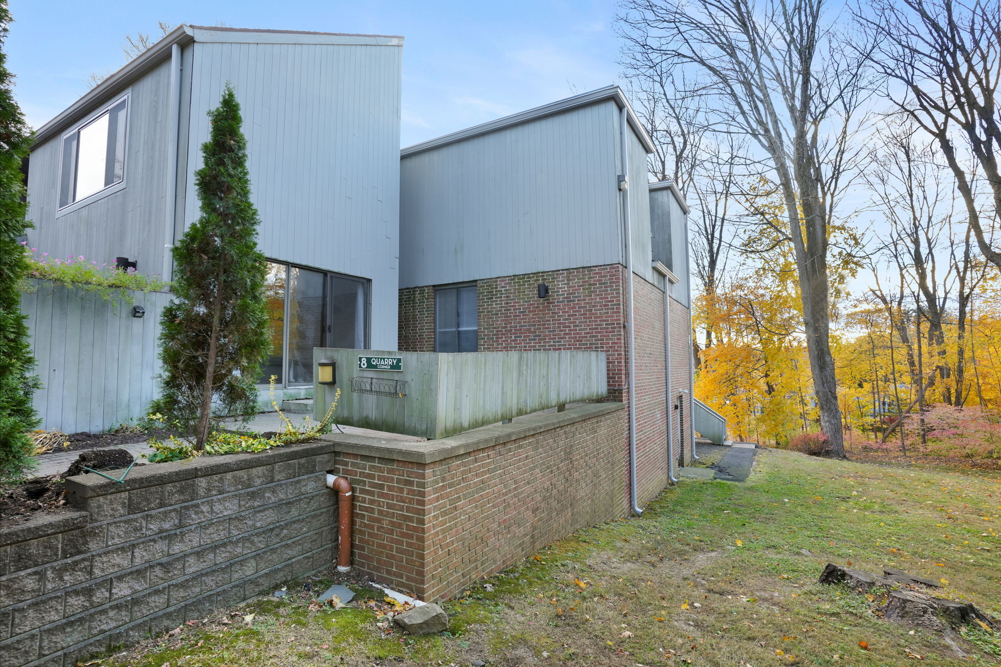 8 Quarry Corner, Unit 8 Ridgefield, CT 06877 - Photo 27 of 28 a view of a house with a yard