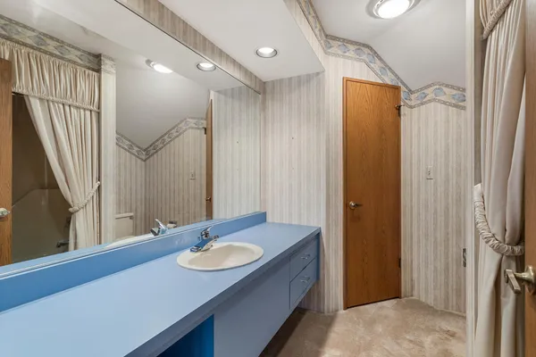 a view of room and bedroom