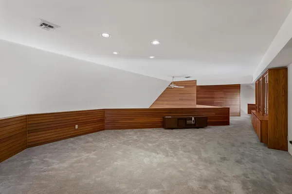 an empty room with windows
