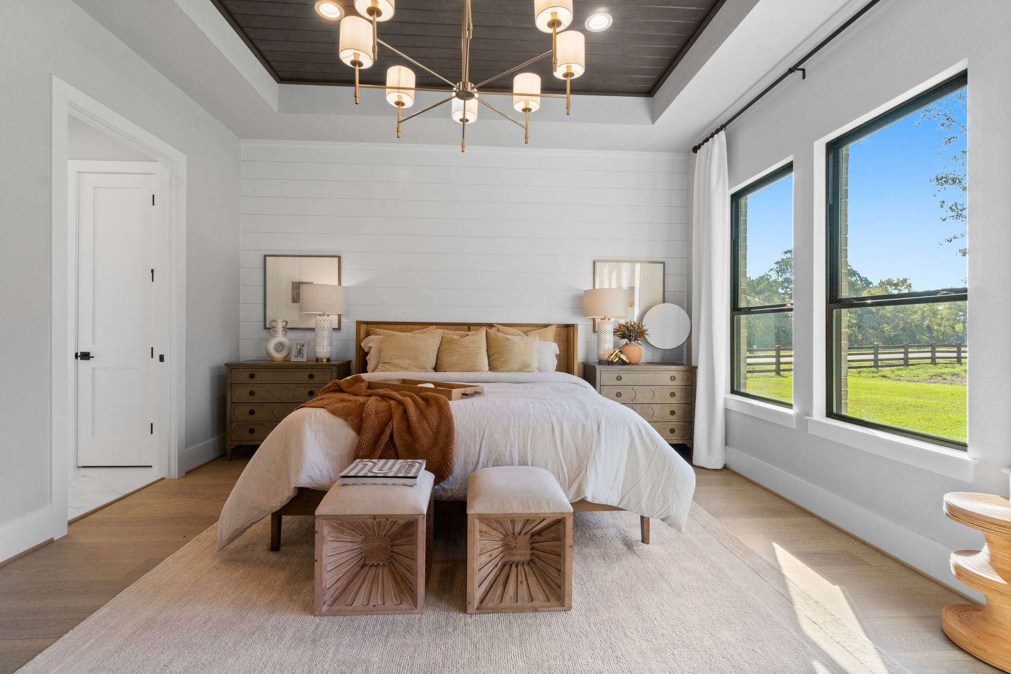 Lot 13 Homestead Hill Road New Waverly, TX 77358 - Photo 6 of 10 a bedroom with a bed and large window