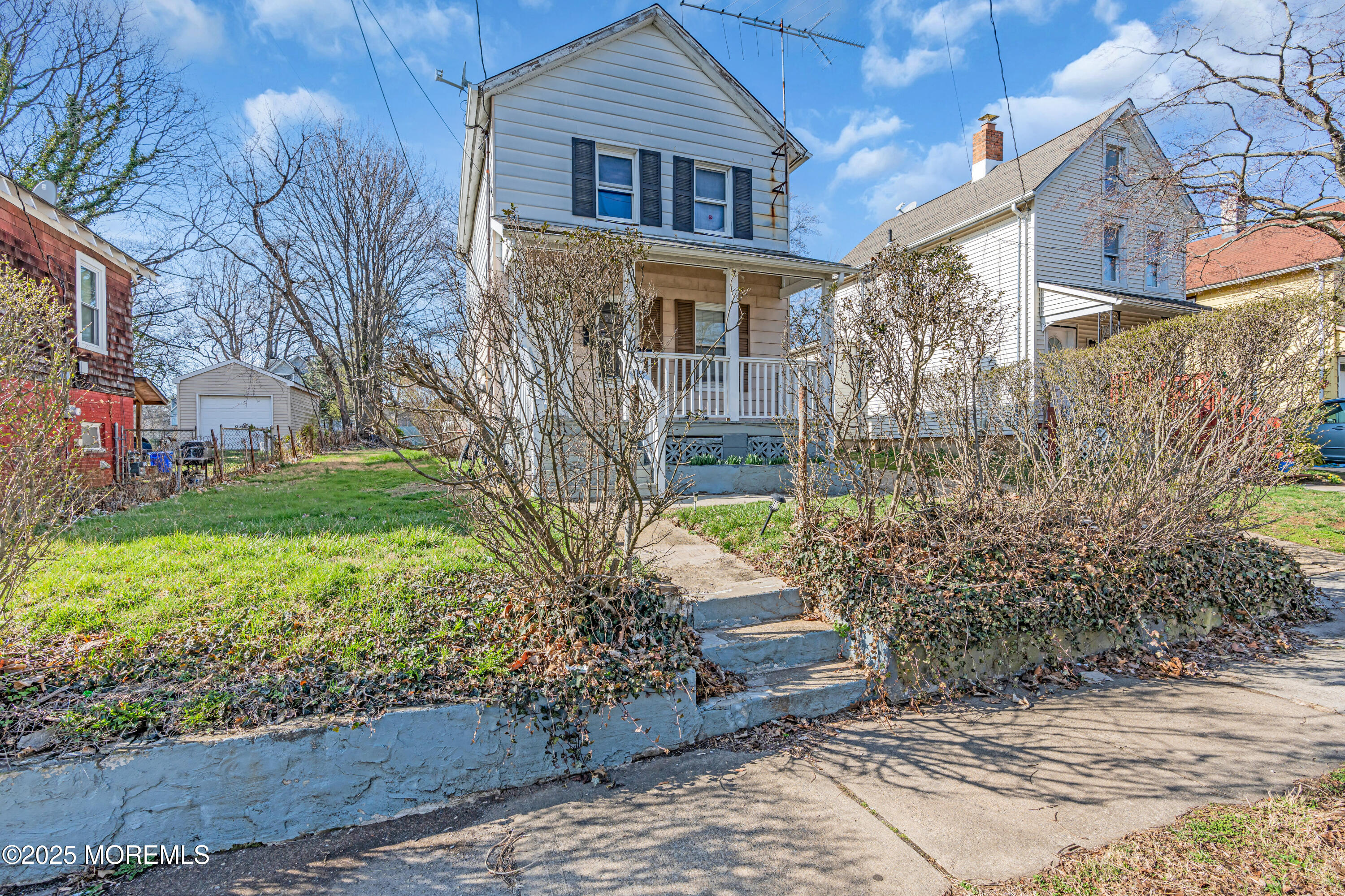 21 Bowne Avenue Freehold, NJ 07728 - Photo 19 of 25 a view of a house with a yard