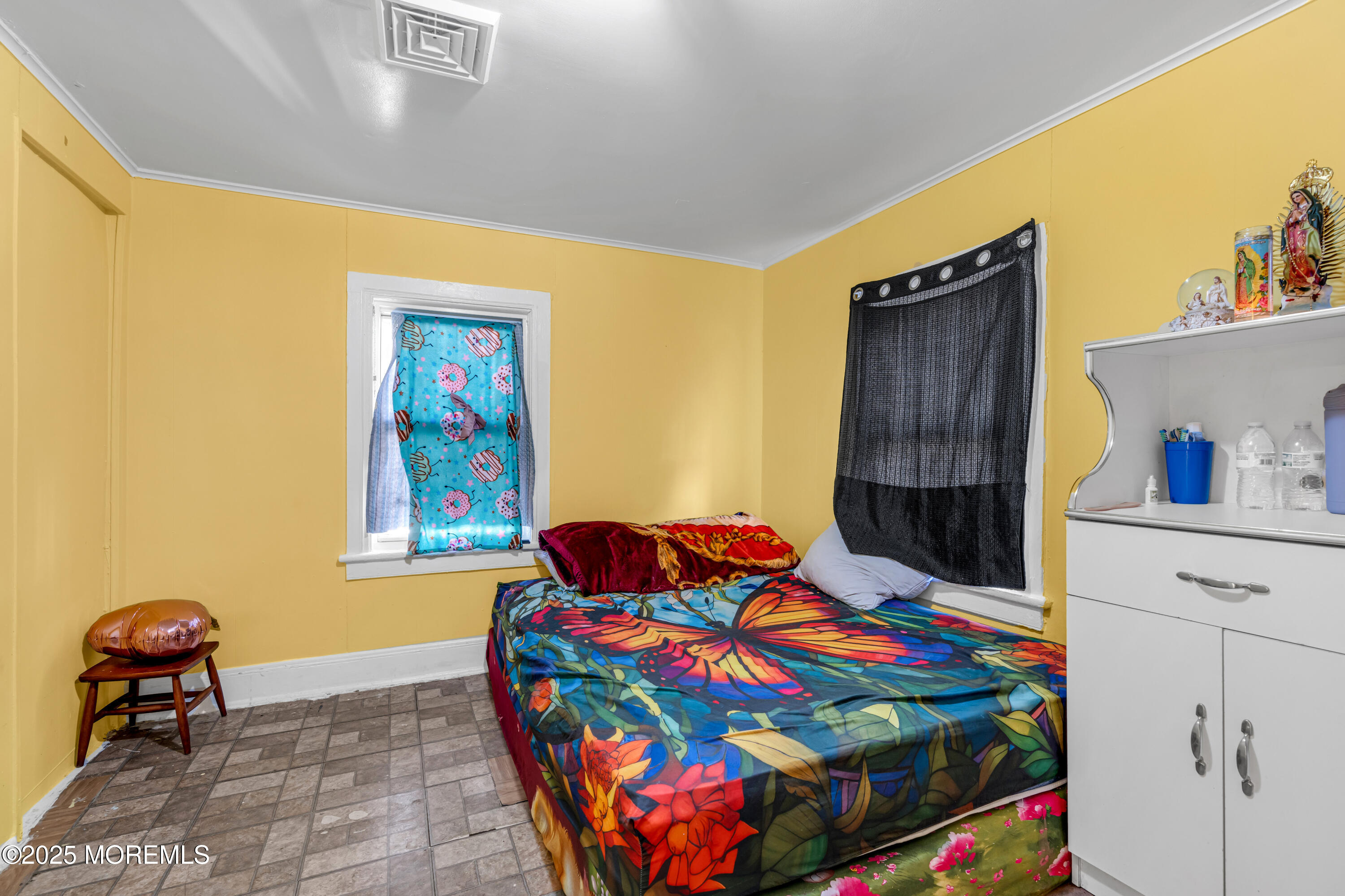 21 Bowne Avenue Freehold, NJ 07728 - Photo 10 of 25 a bedroom with a bed and wooden floor