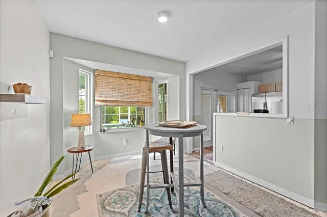 a view of a livingroom with furniture window and a livingroom