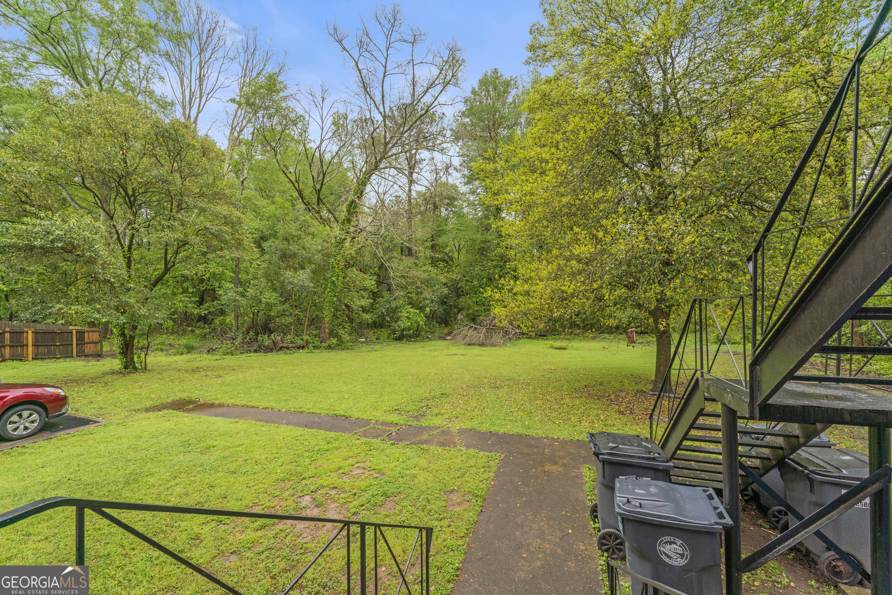147 Burnside Street, Unit 4 Jonesboro, GA 30236 - Photo 9 of 9 a view of a yard with an outdoor seating