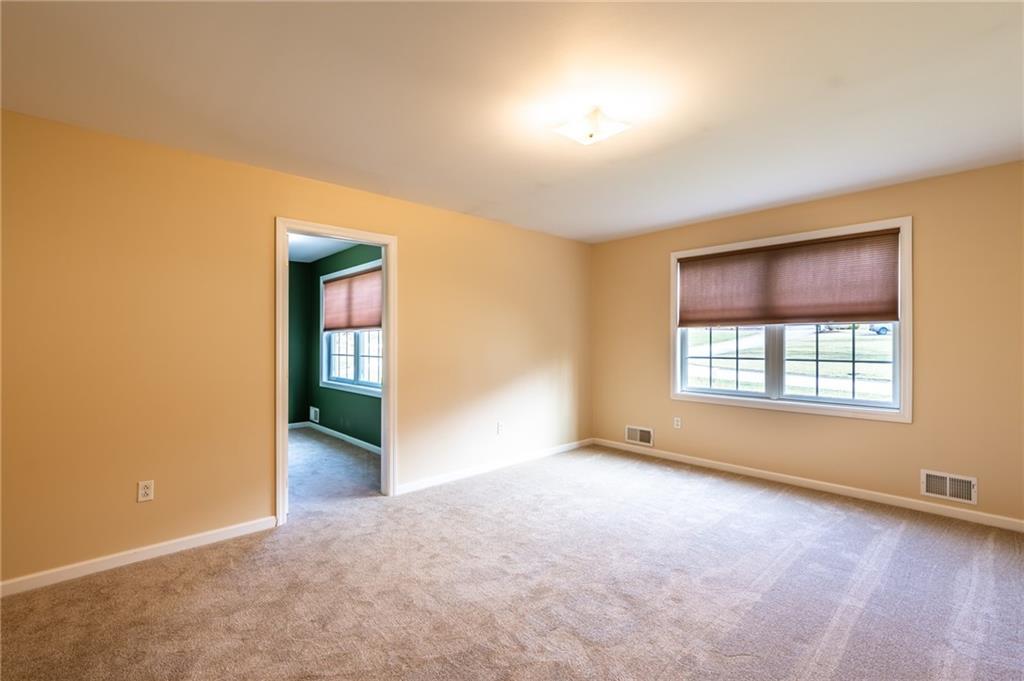 156 Chickadee Road Kittanning, PA 16201 - Photo 18 of 25 an empty room with windows and closet