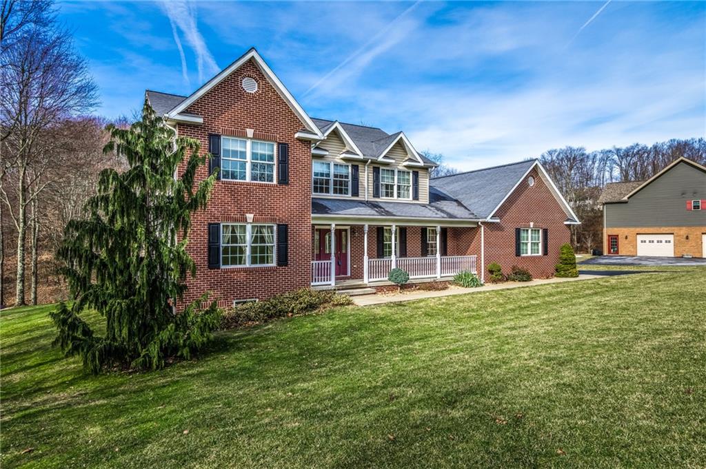 156 Chickadee Road Kittanning, PA 16201 - Photo 2 of 25 a front view of a house with a yard