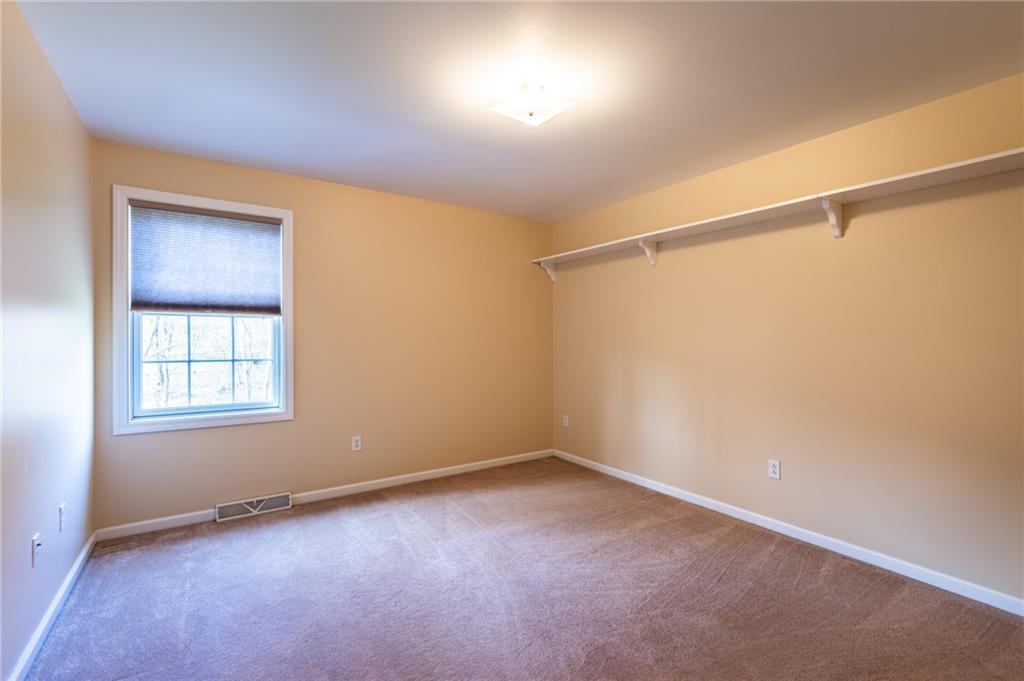 156 Chickadee Road Kittanning, PA 16201 - Photo 22 of 25 an empty room with a window and closet