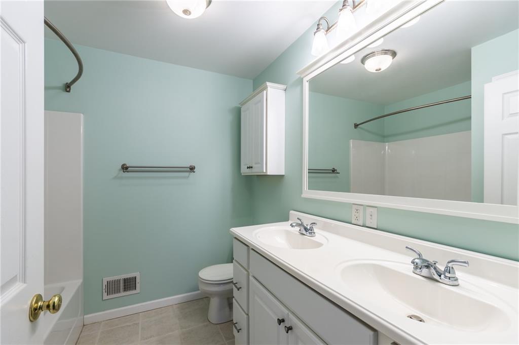 156 Chickadee Road Kittanning, PA 16201 - Photo 24 of 25 a bathroom with a sink a toilet and shower