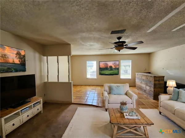 a view of an empty room and window