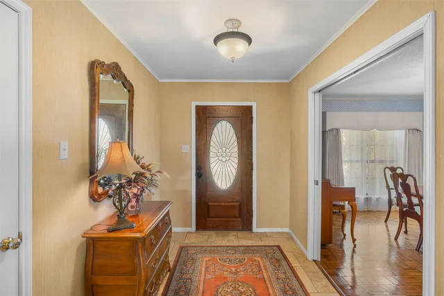 a front view of a house with wooden floor
