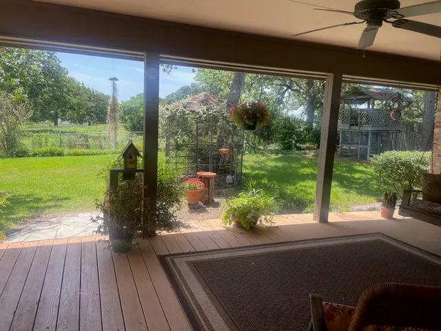 a house view with a sitting space and garden view
