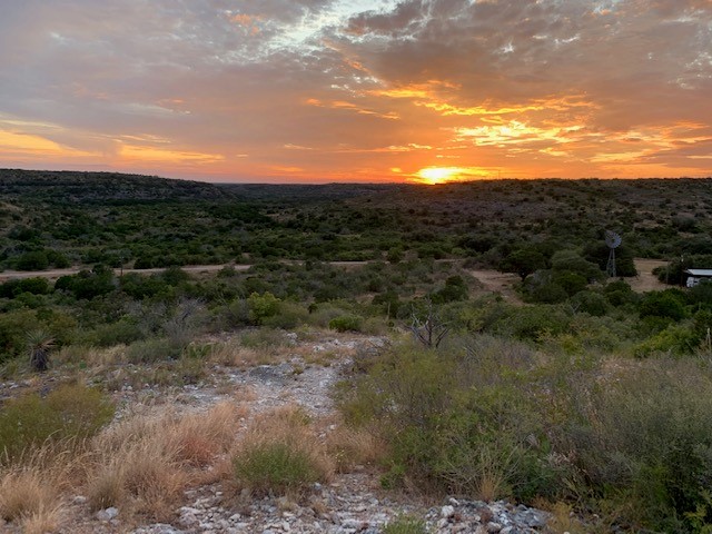 58 L Leona Ranch Road Brackettville, TX 78832 - Photo 12 of 12 a view of a city with lush green forest