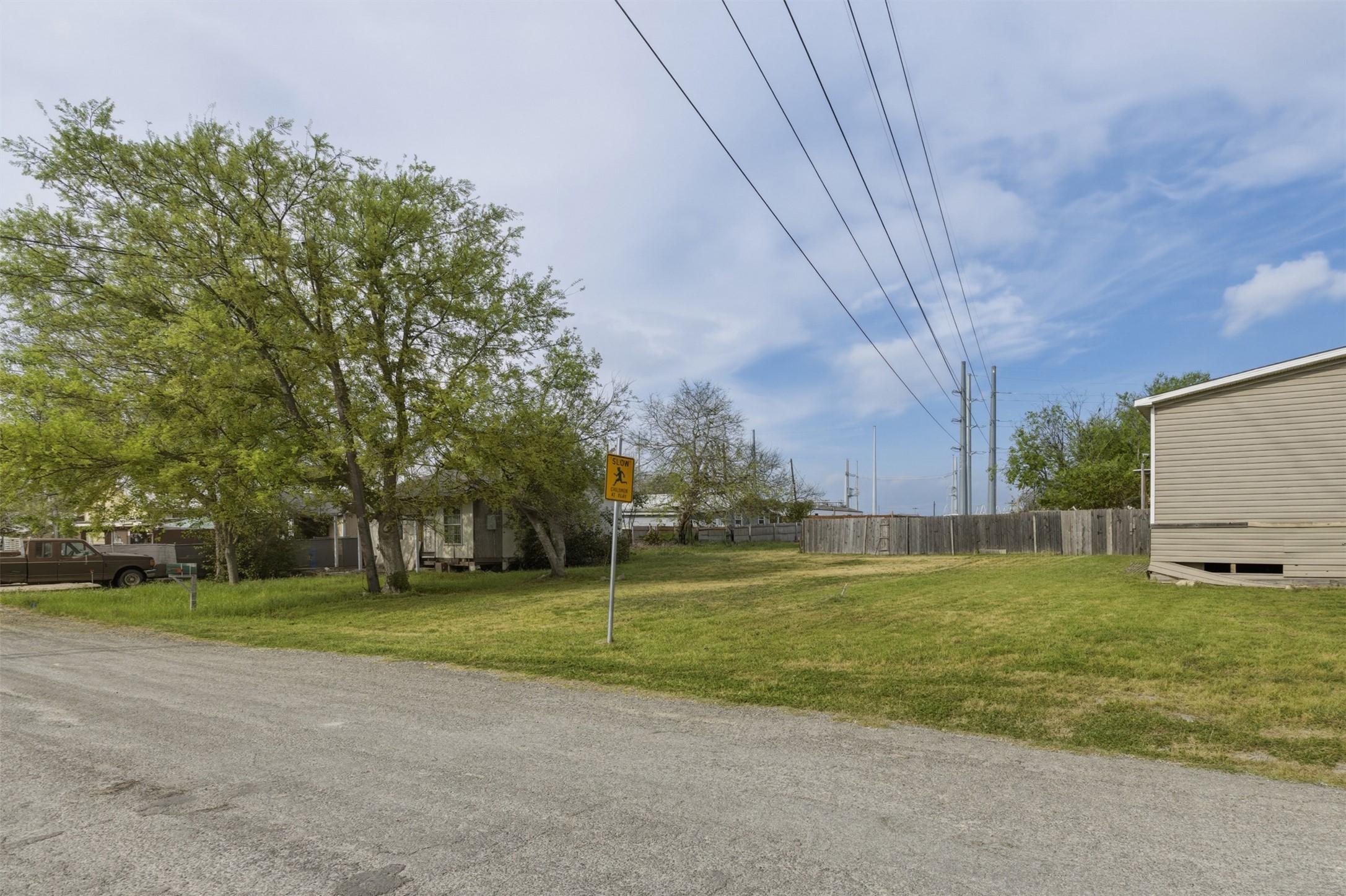 104 Royal Street Taylor, TX 76574 - Photo 14 of 21 a view of a field with a trees
