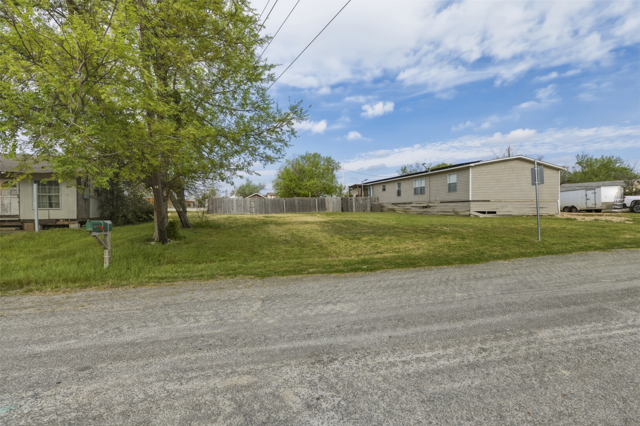 104 Royal Street Taylor, TX 76574 - Photo 16 of 21 a view of a big yard with a house
