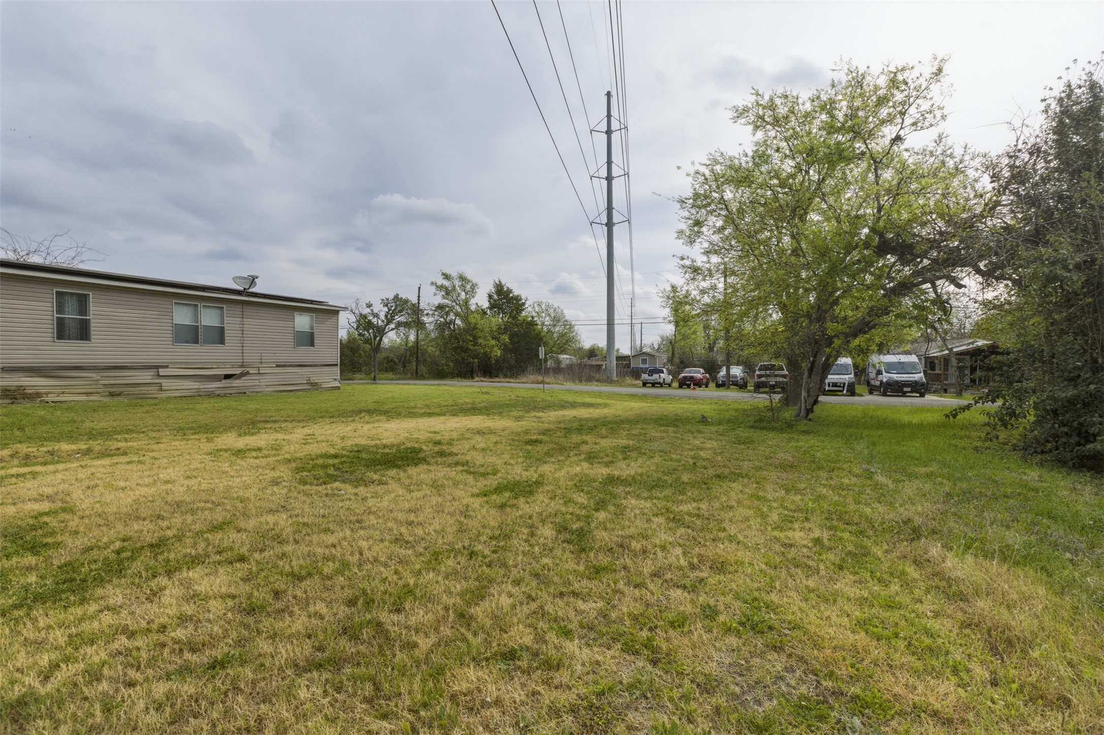 104 Royal Street Taylor, TX 76574 - Photo 18 of 21 a view of a house with a big yard