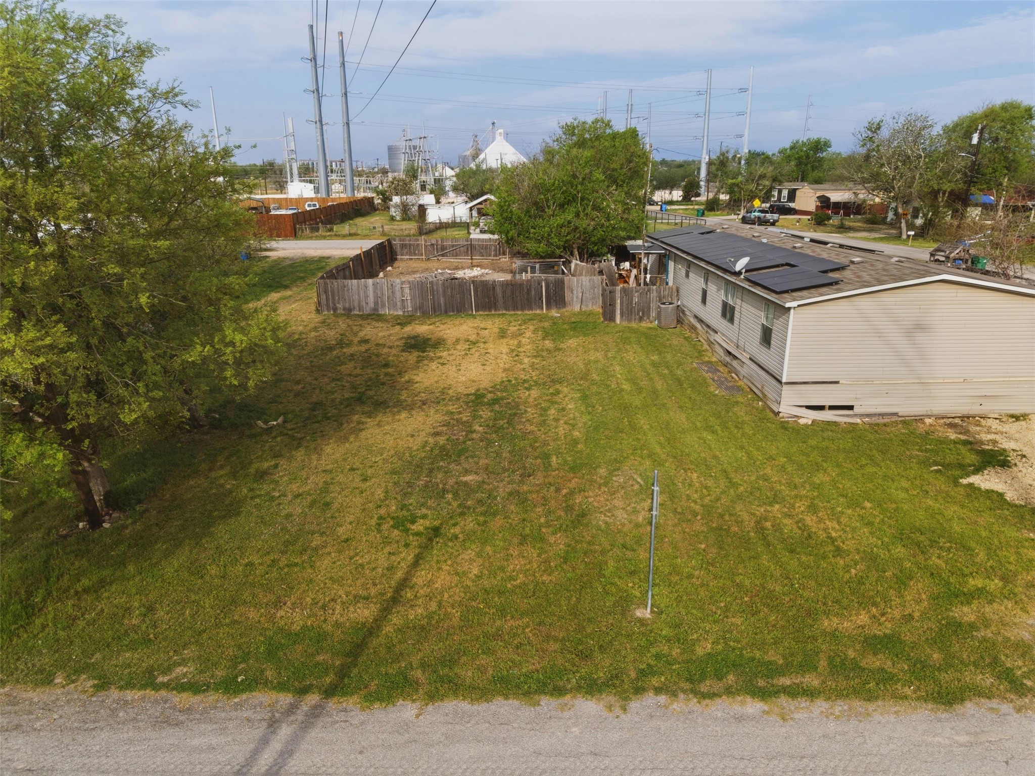 104 Royal Street Taylor, TX 76574 - Photo 2 of 21 a swimming pool with outdoor seating and yard