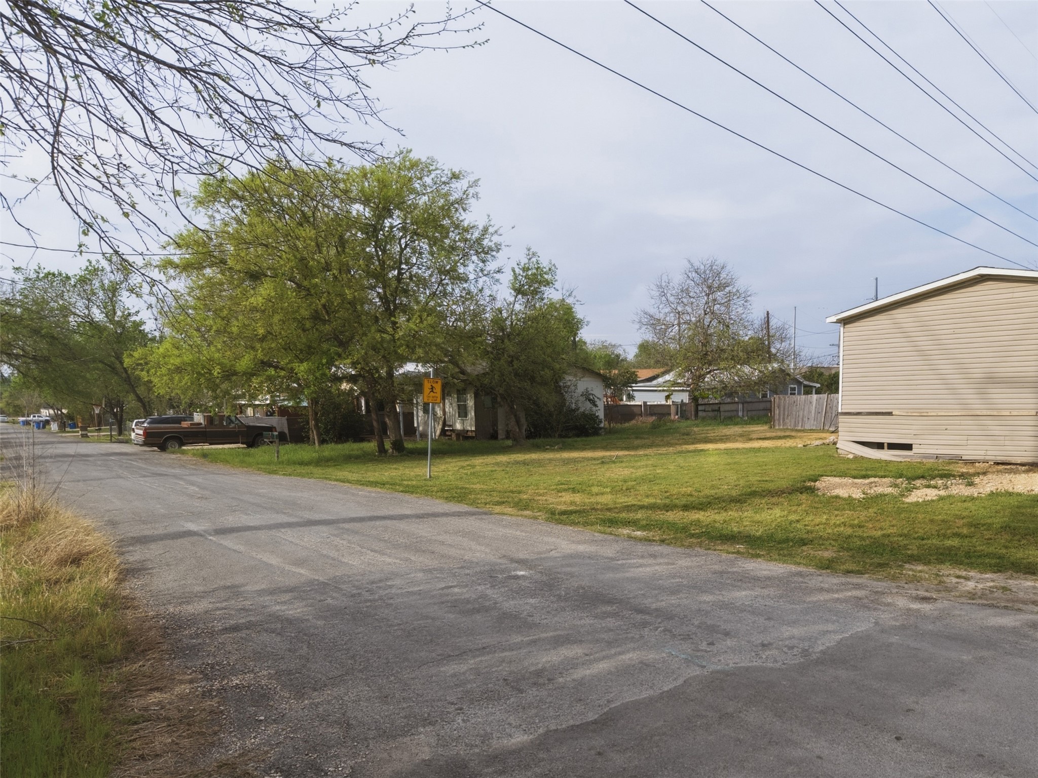 104 Royal Street Taylor, TX 76574 - Photo 10 of 21 a view of a playground with basketball court