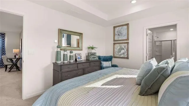 a bedroom with a bed and furniture