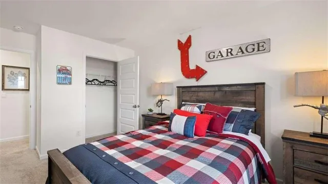 a bed room with a bed and a fireplace