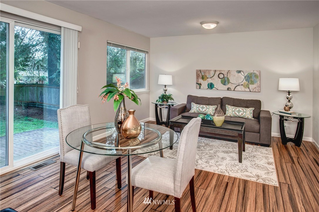 23613 Meridian Place West Bothell, WA 98021 - Photo 18 of 32 a living room with furniture and a wooden floor