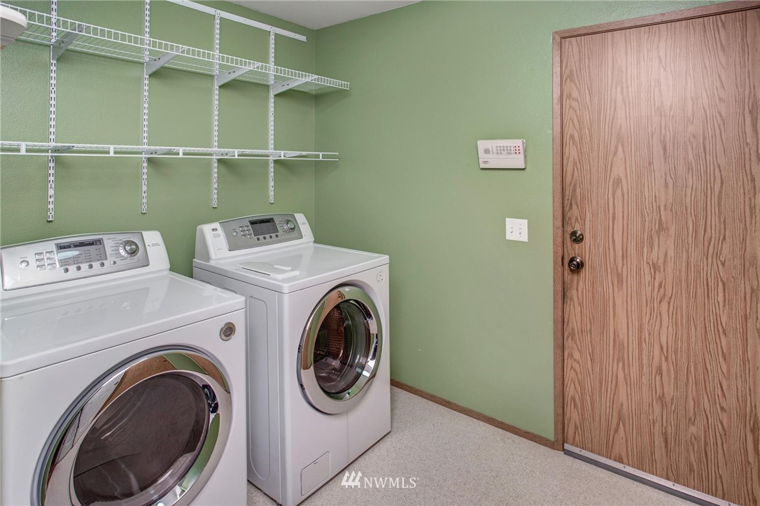 23613 Meridian Place West Bothell, WA 98021 - Photo 22 of 32 a utility room with dryer and washer