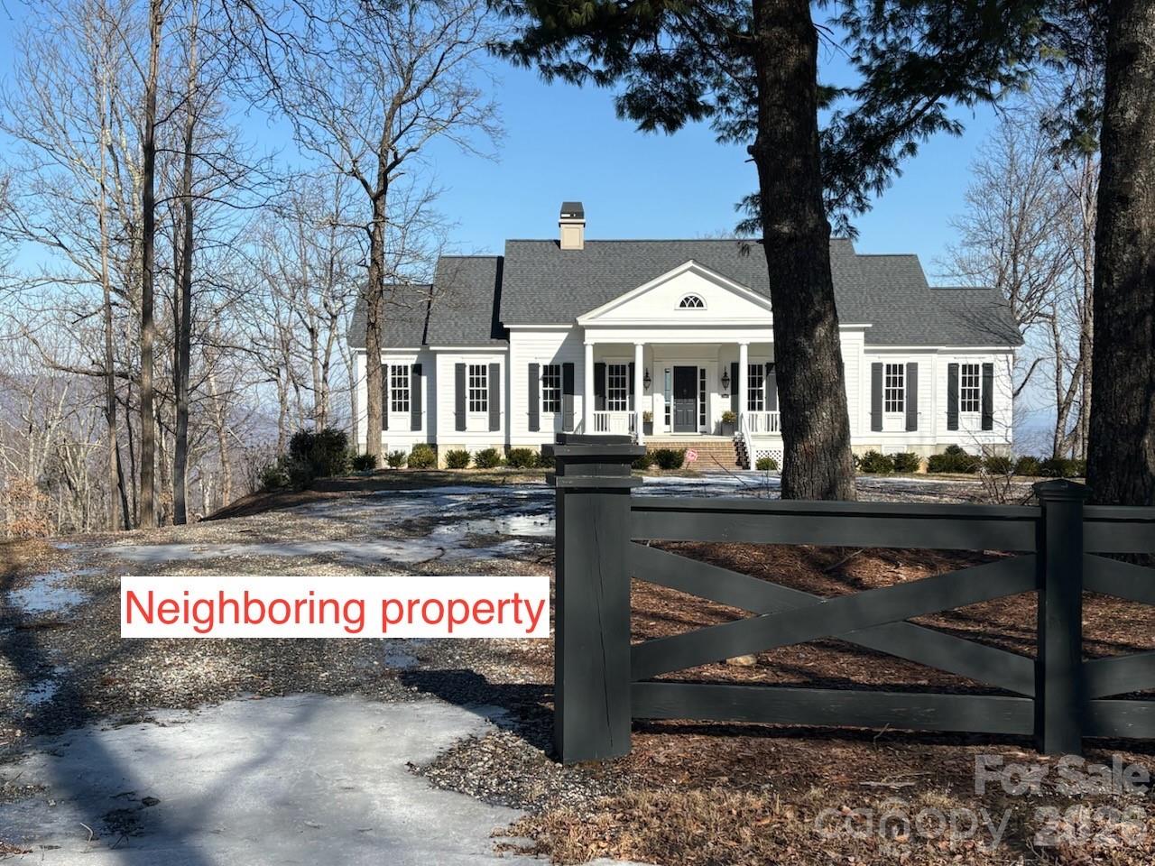 700 Summit Road Tryon, NC 28782 - Photo 27 of 27 a sign that is sitting in front of a house