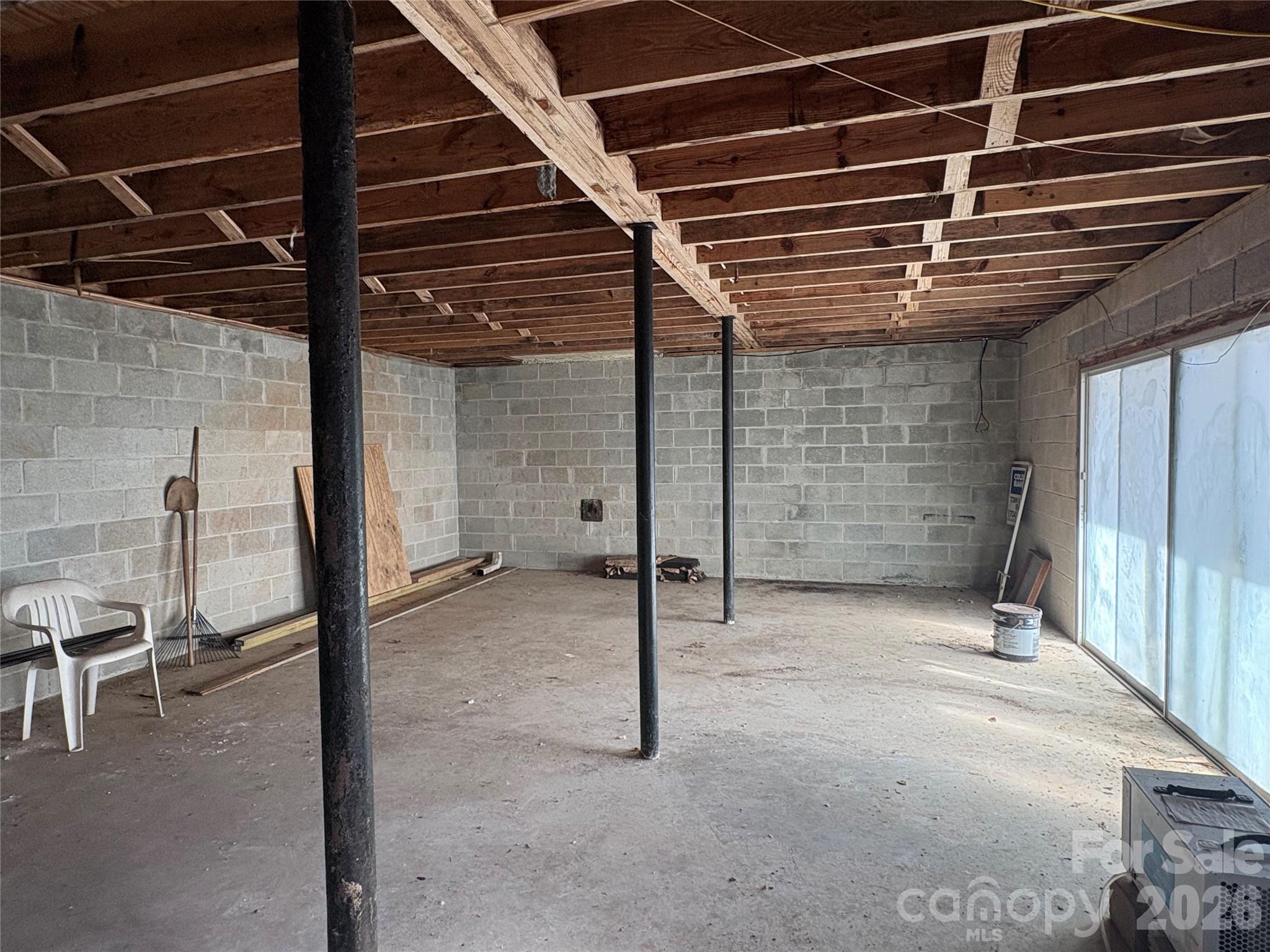 700 Summit Road Tryon, NC 28782 - Photo 7 of 27 a view of an empty room with wooden floor