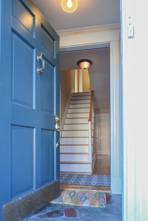 24 Homestead Road Marblehead, MA 01945 - Photo 3 of 29 a view of a hallway with wooden floor and staircase