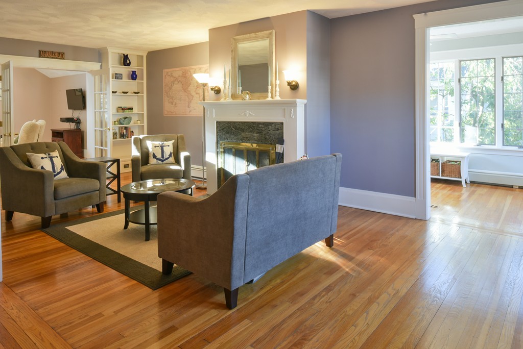 24 Homestead Road Marblehead, MA 01945 - Photo 5 of 29 a living room with furniture and a fireplace