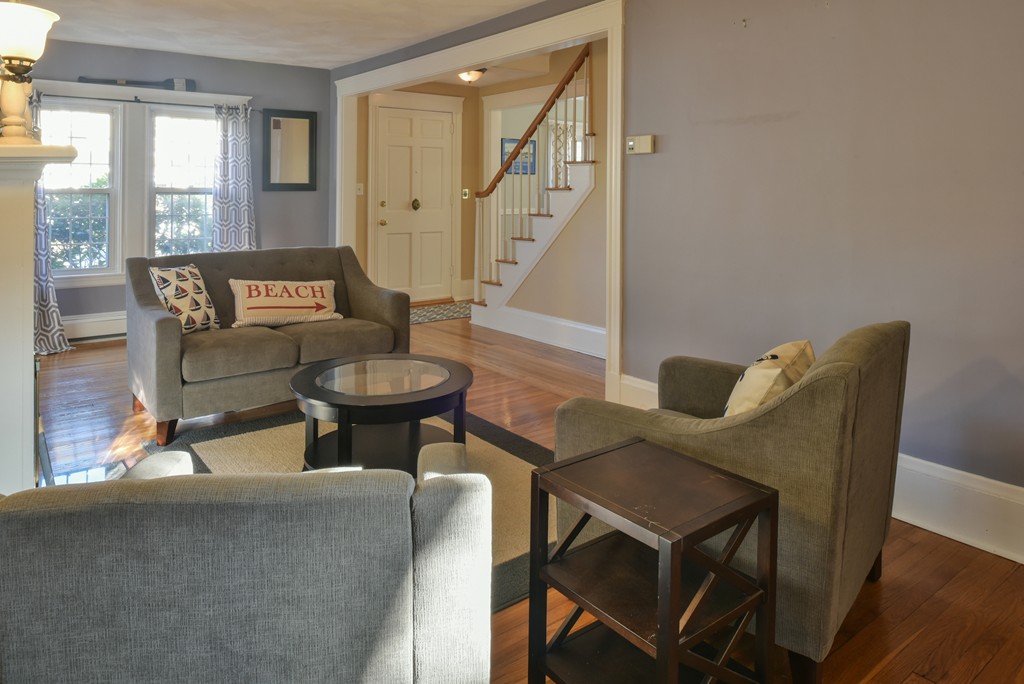 24 Homestead Road Marblehead, MA 01945 - Photo 8 of 29 a living room with furniture and a potted plant
