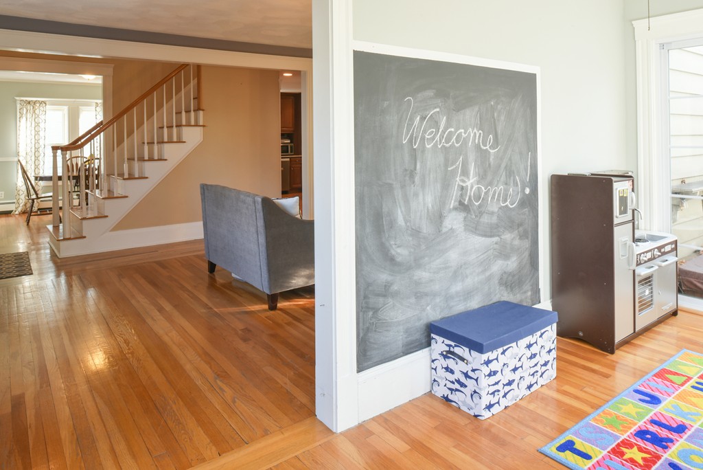 24 Homestead Road Marblehead, MA 01945 - Photo 10 of 29 a living room with furniture and a table