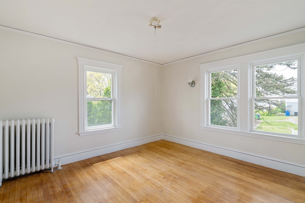 21 Perkins Avenue Boston, MA 02136 - Photo 12 of 26 a view of an empty room with a window
