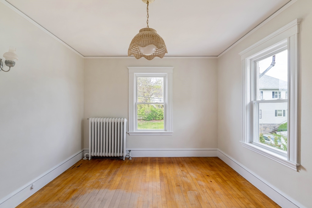 21 Perkins Avenue Boston, MA 02136 - Photo 14 of 26 a view of a room with window wooden floor and windows