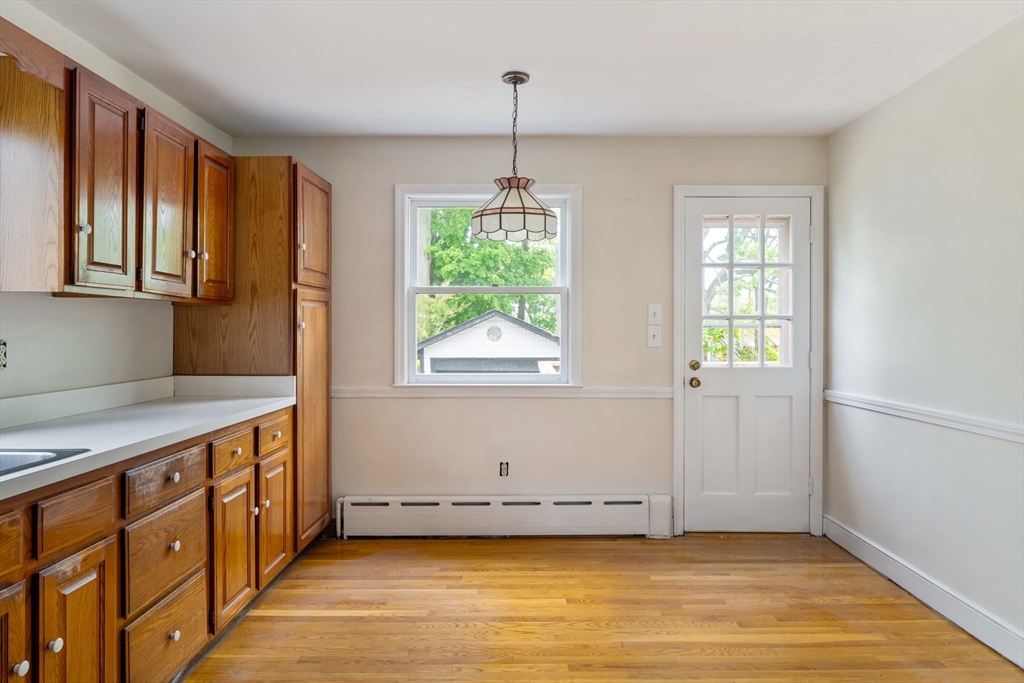 21 Perkins Avenue Boston, MA 02136 - Photo 9 of 26 a view of an empty room with a window