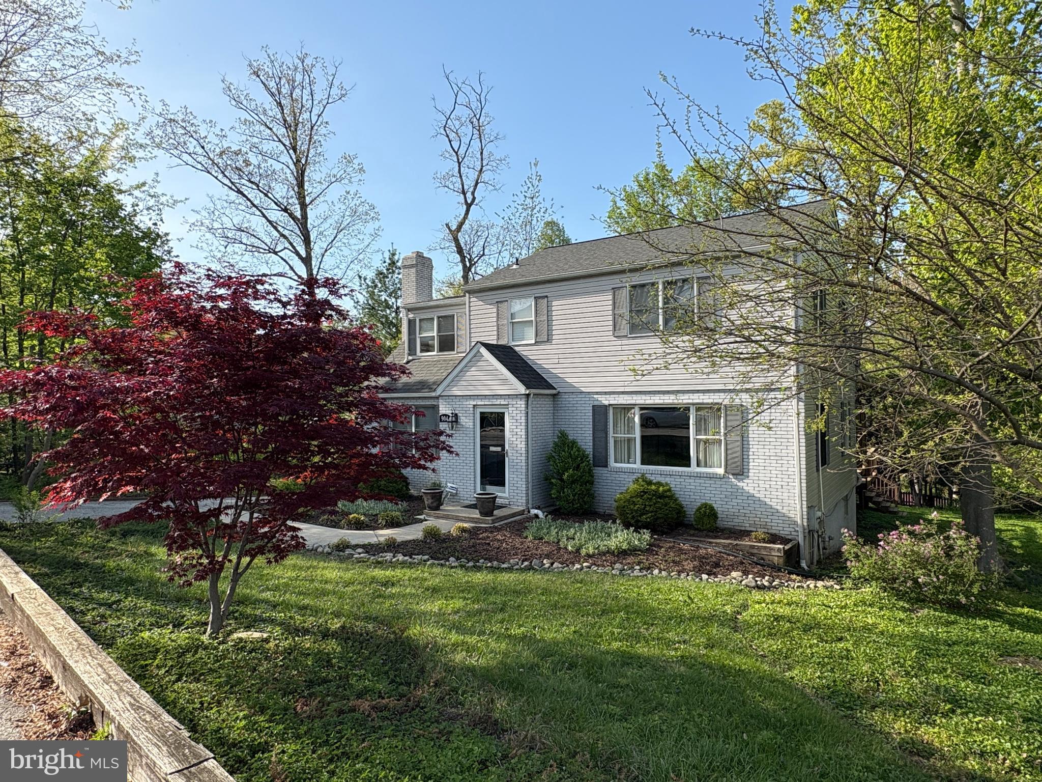 904 Litchfield Road Baltimore, MD 21239 - Photo 7 of 13 a front view of house with yard and green space