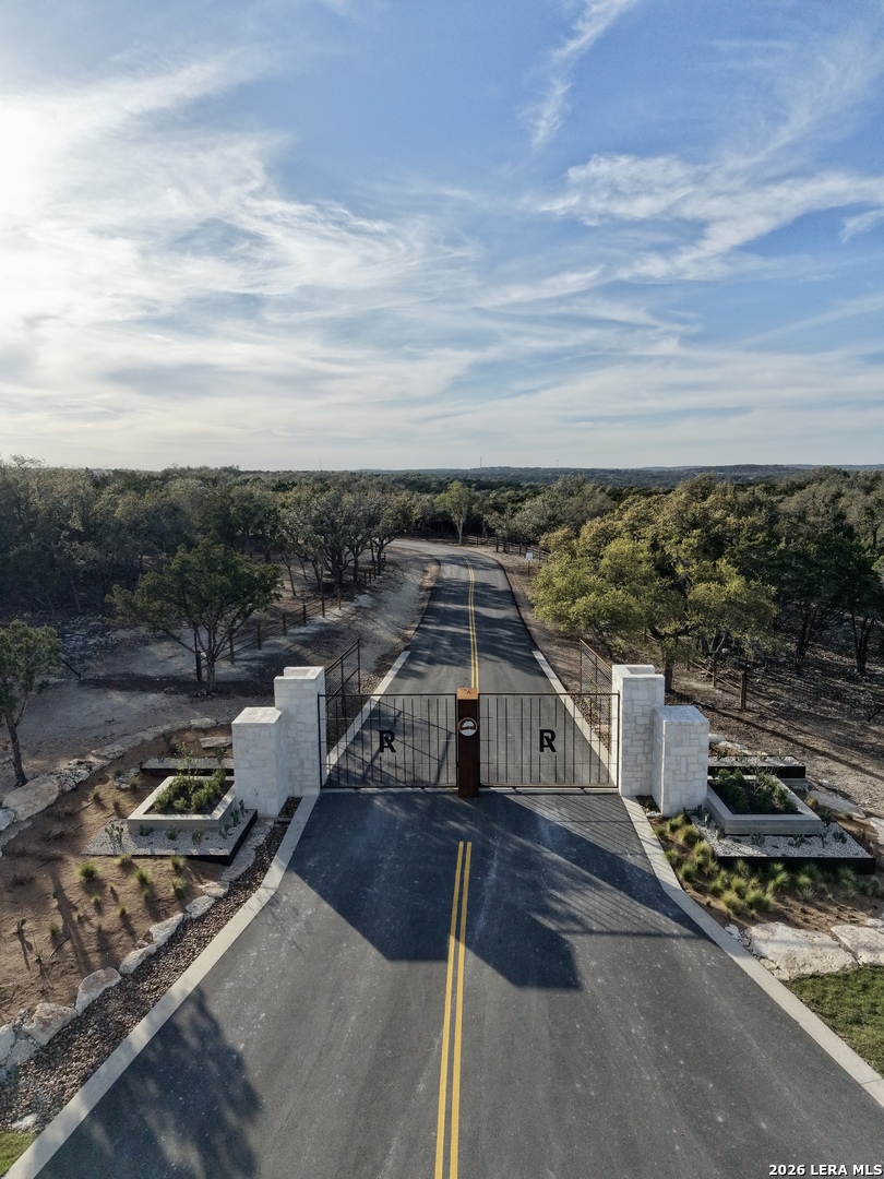 136 Cedar Forest Point Fischer, TX 78623 - Photo 17 of 18 a view of a house with roof deck