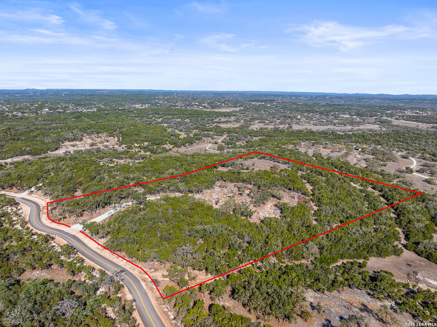 136 Cedar Forest Point Fischer, TX 78623 - Photo 7 of 18 an aerial view of residential houses with outdoor space and trees