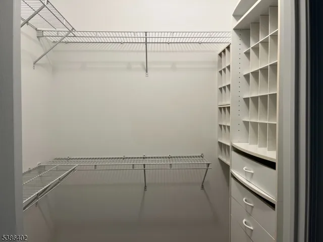 a view of a room with racks on the wall