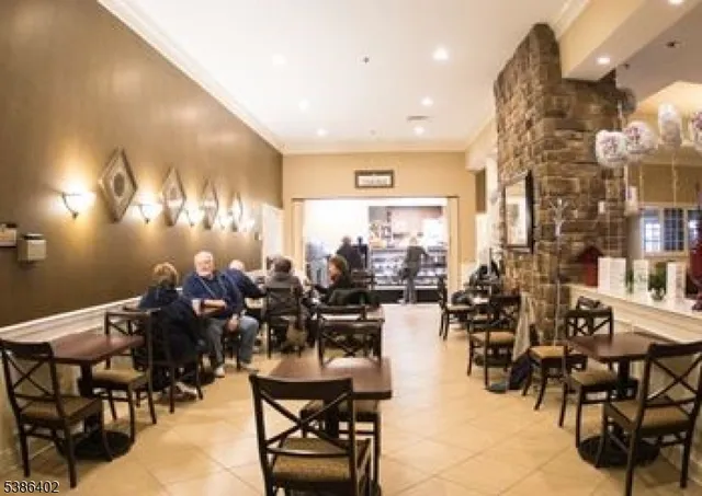 a swimming pool view with a outdoor seating