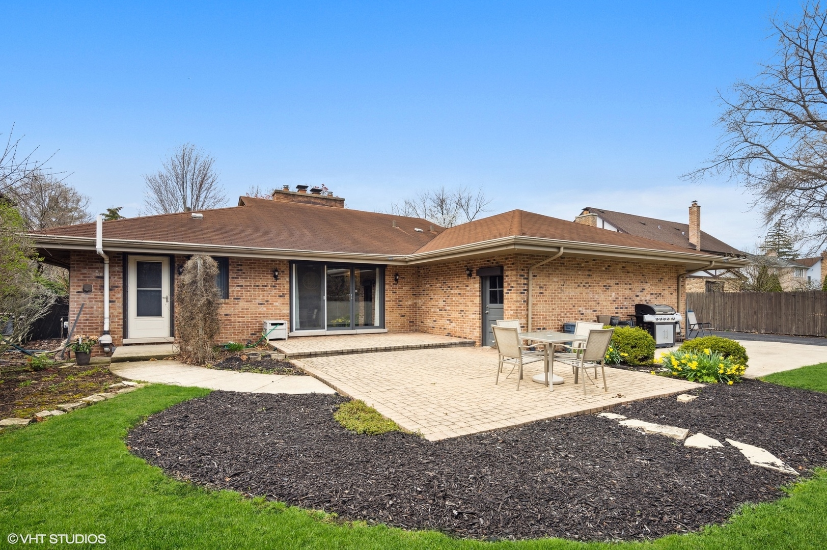 25 Princeton Road Hinsdale, IL 60521 - Photo 35 of 39 a front view of a house with a garden and patio