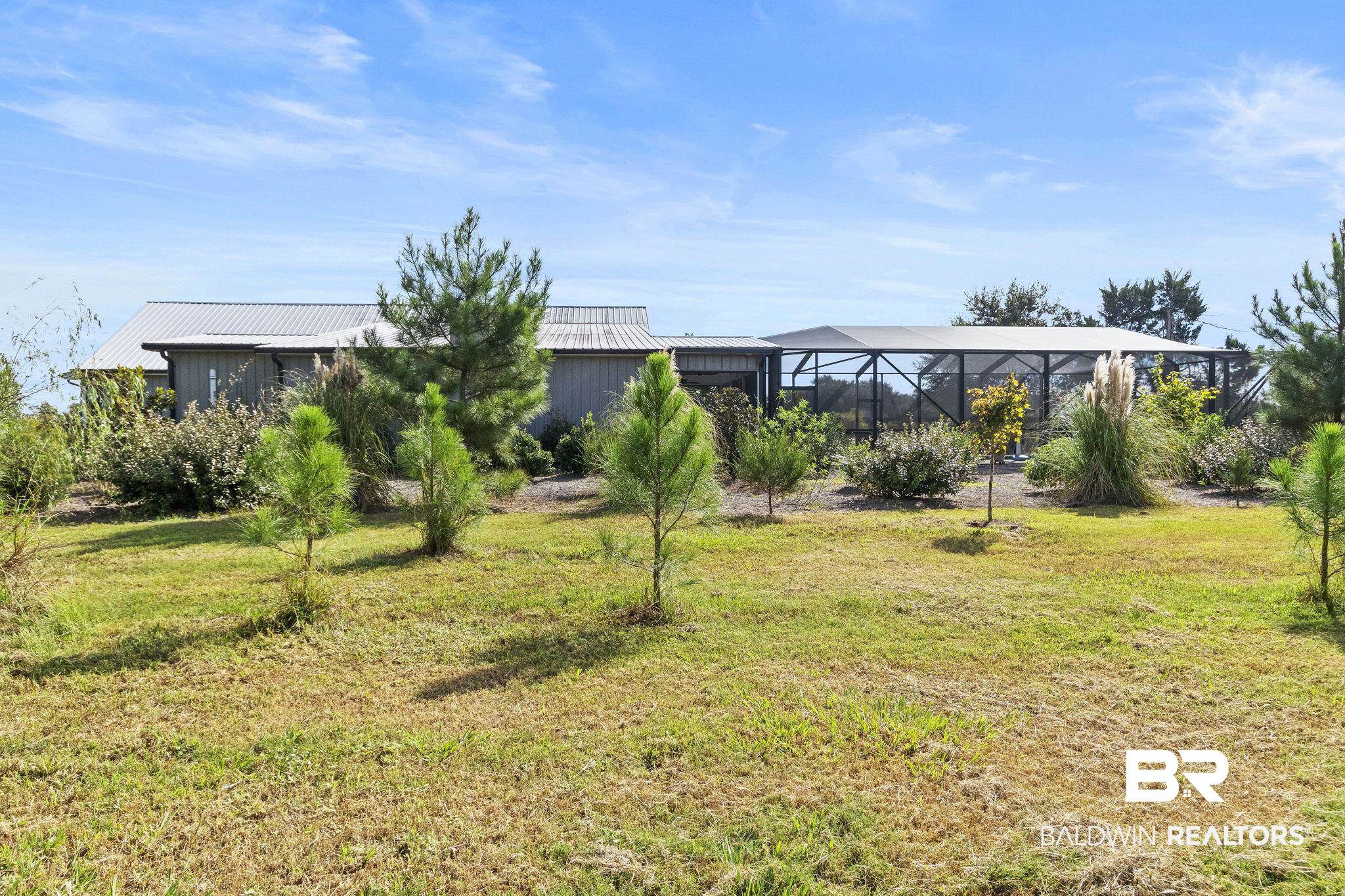 26071 Woerner Road Elberta, AL 36530 - Photo 60 of 86 View of yard with a lanai