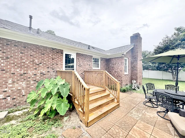a view of balcony with furniture