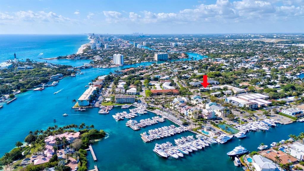 2755 Northeast 28th Avenue, Unit A3 Lighthouse Point, FL 33064 - Photo 2 of 27 an aerial view of a houses and an outdoor space