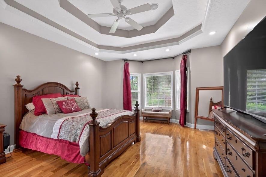 15 Fast Lane Ranburne, AL 36273 - Photo 33 of 51 a bedroom with a bed and a chandelier