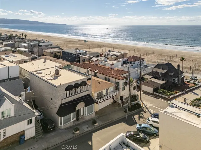 an aerial view of a building with outdoor space