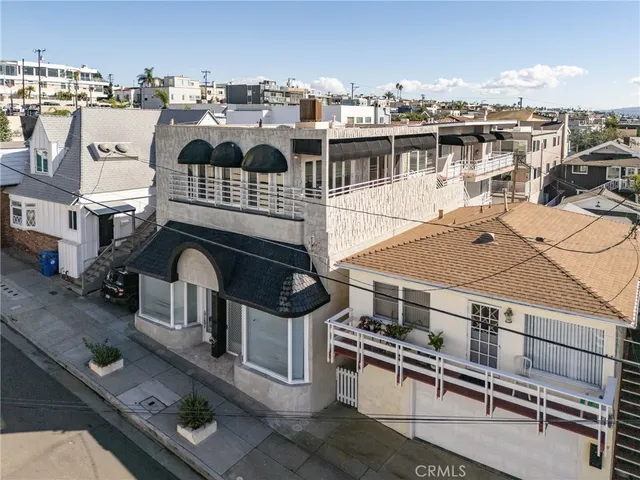 an aerial view of a building with outdoor space