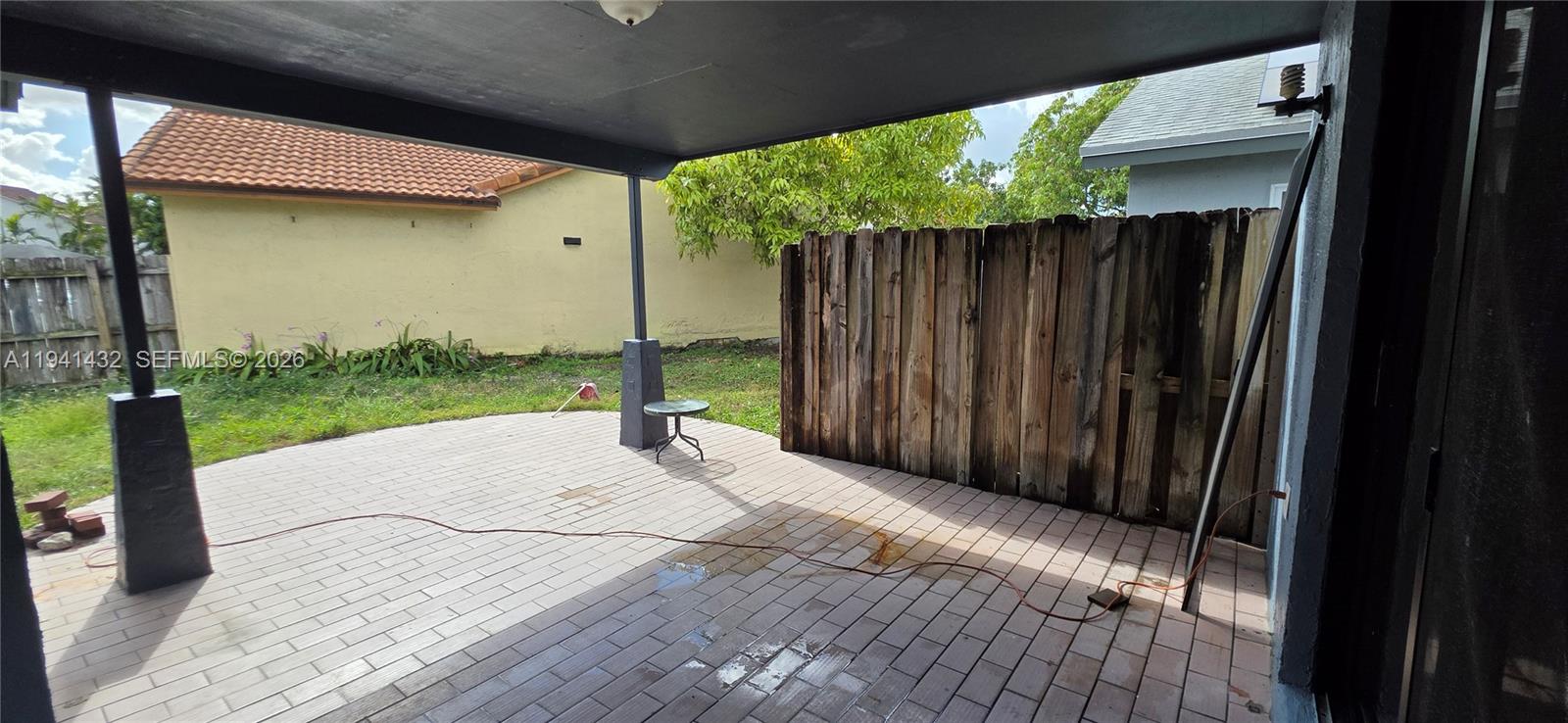 15238 Southwest 58th Terrace Miami, FL 33193 - Photo 11 of 46 a backyard of a house