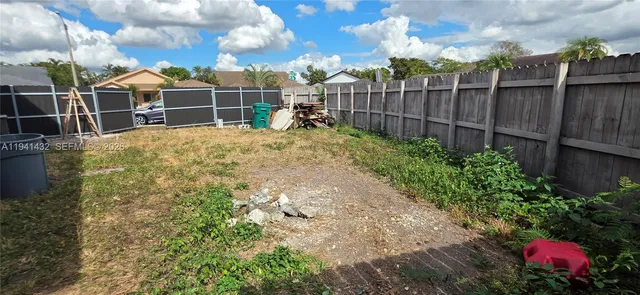 a kitchen with a sink and a stove top oven