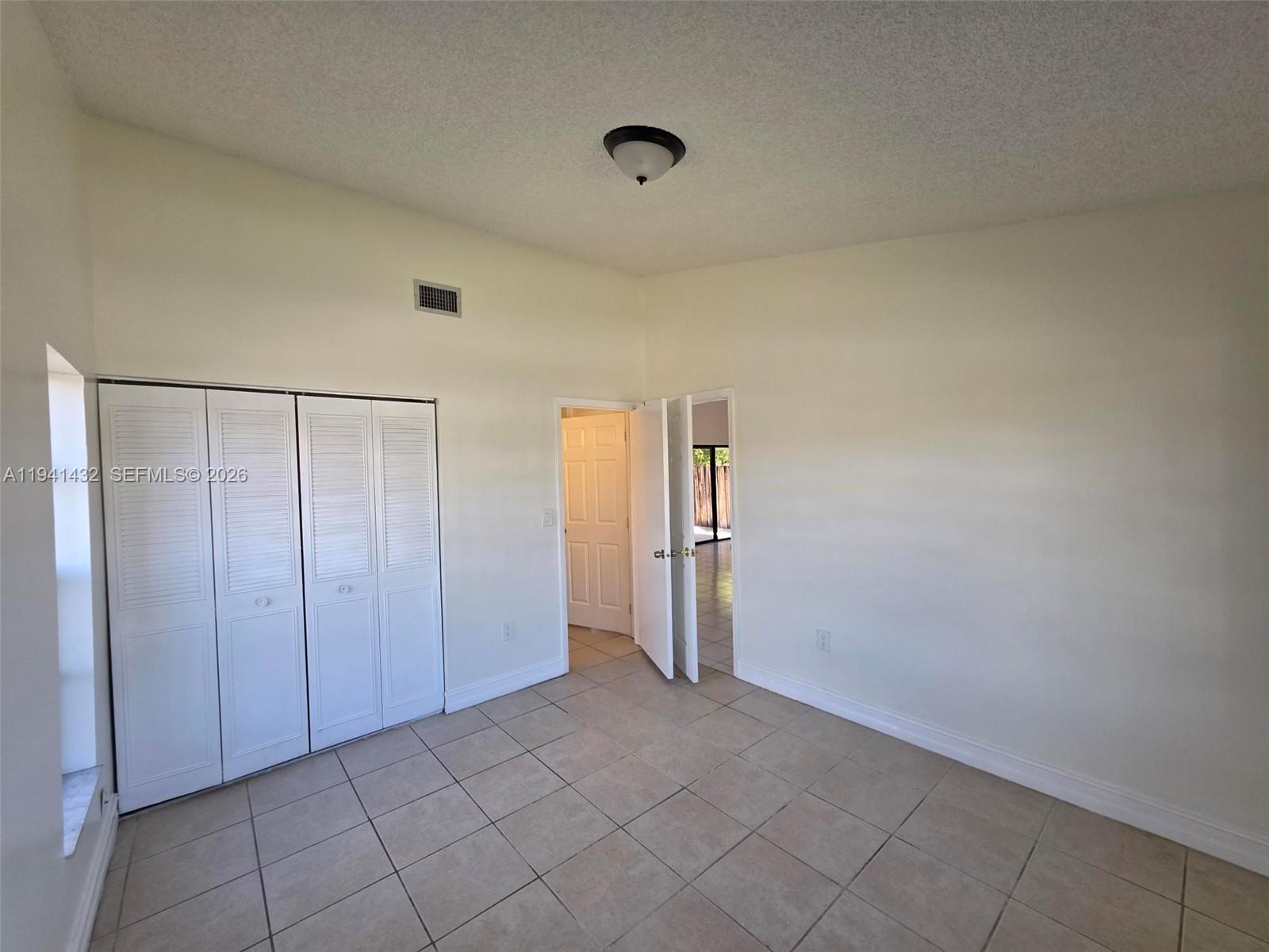 15238 Southwest 58th Terrace Miami, FL 33193 - Photo 16 of 38 a view of an empty room